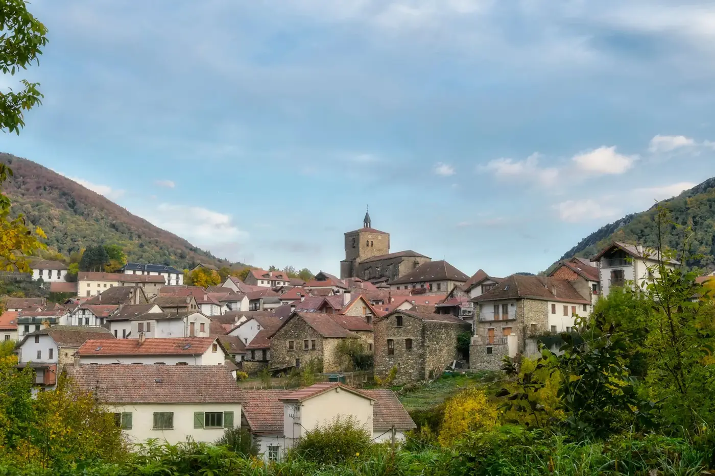 Picturesque town of Isaba in Navarre with historical architecture and lush mountains.