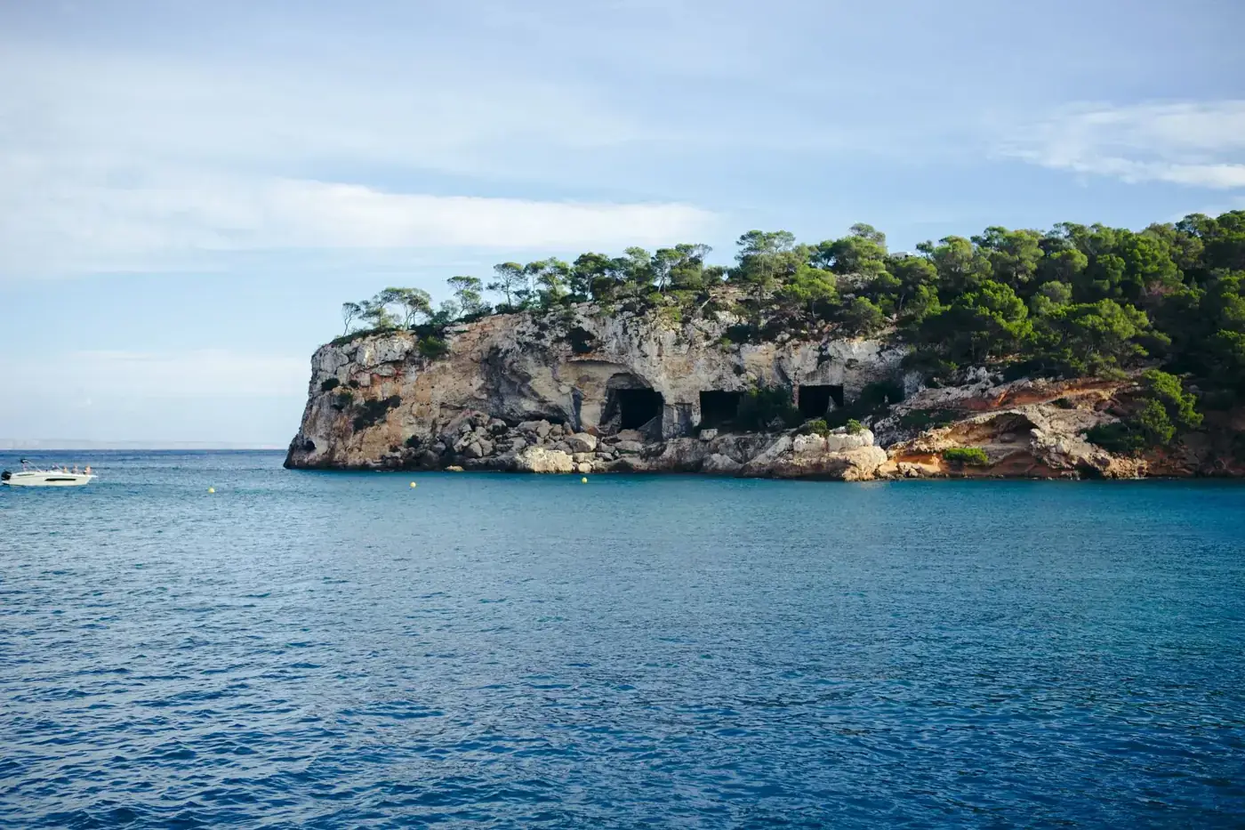 Explore the stunning cliffs and turquoise waters of Mallorca's Mediterranean coastline.