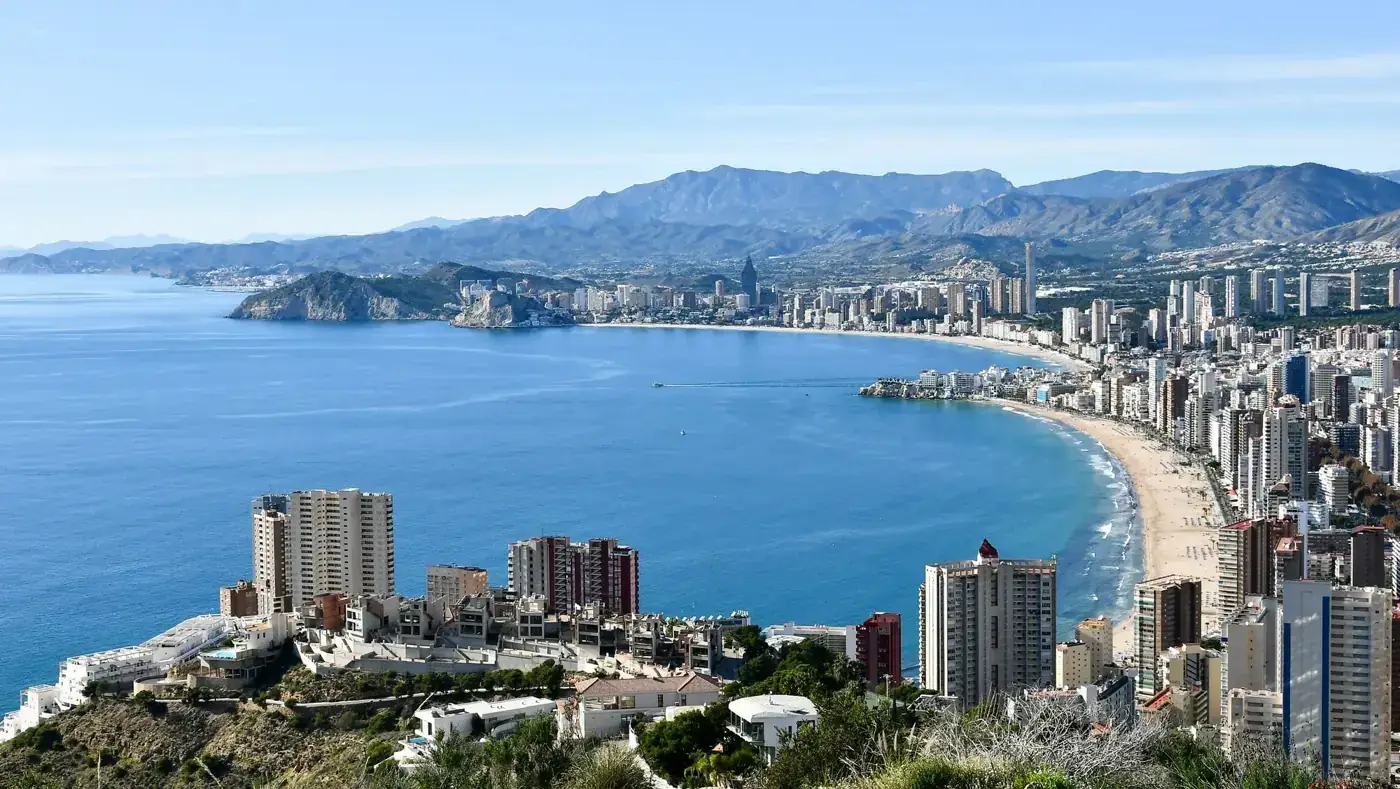 Aerial view showing the beautiful skyline and coast of Benidorm, Spain.
