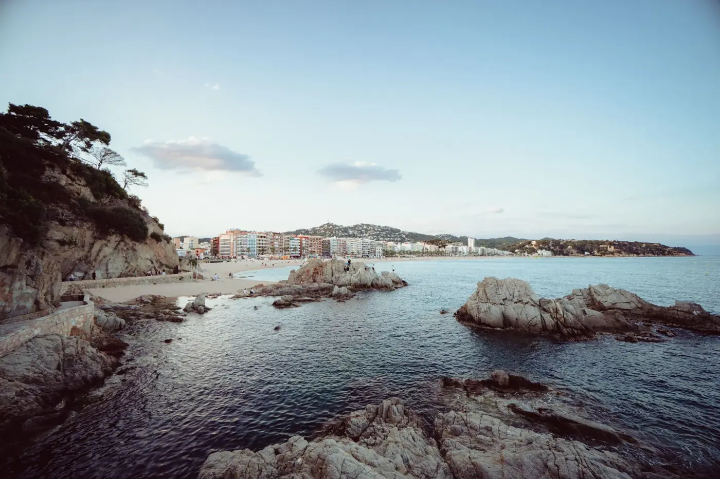 Beautiful coastal landscape of Lloret de Mar, Spain, featuring rocky shores and the Mediterranean Sea.