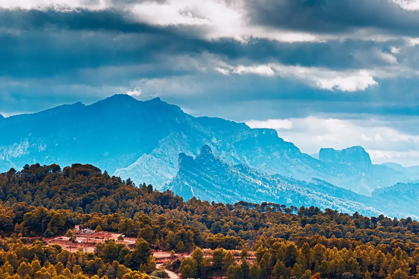 Breathtaking view of the Montsià mountains in Tarragona, Spain under moody skies.