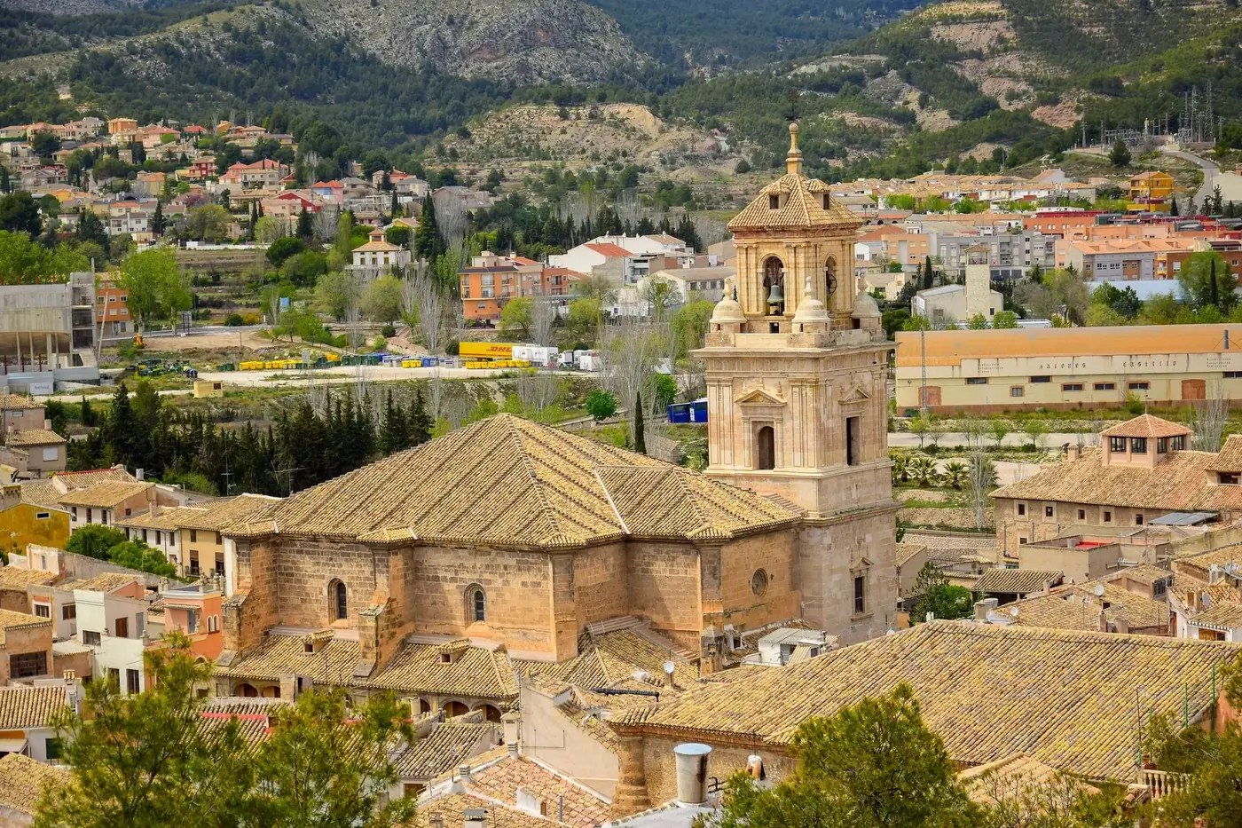 Street view in Cartagena, Spain showcasing classic architecture and bustling atmosphere.