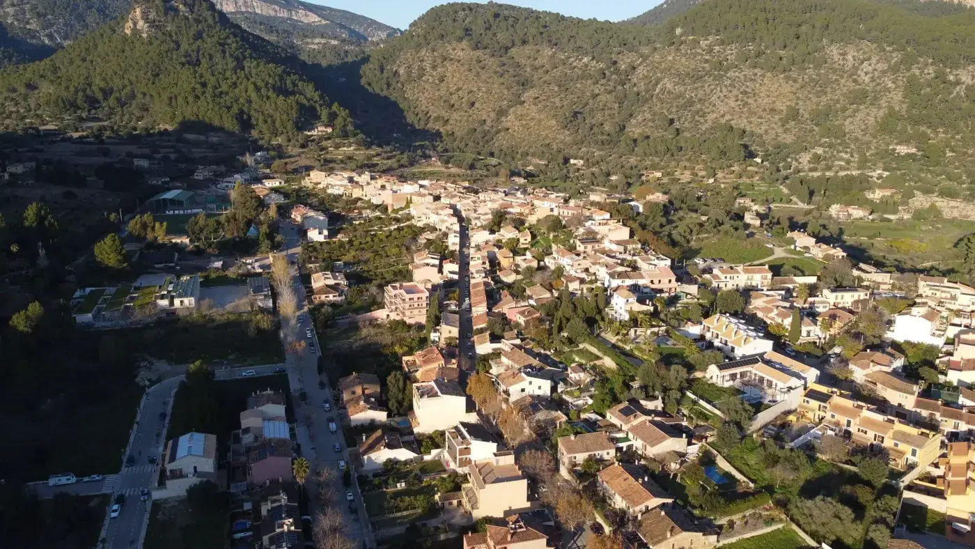 Scenic aerial view of Puigpunyent village nestled in the mountains of Mallorca, Spain.