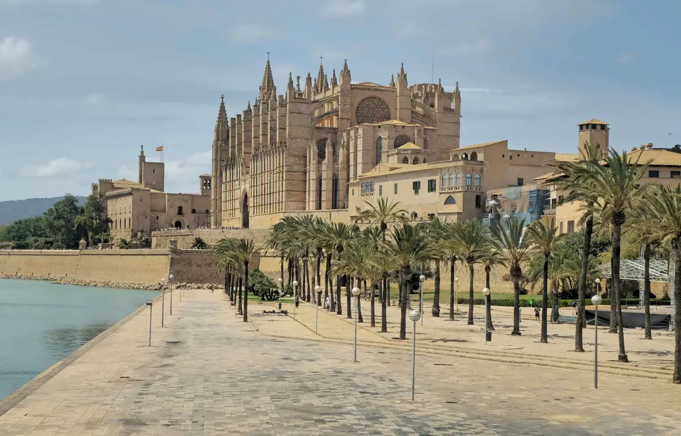 A breathtaking view of the Palma Cathedral and promenade in Mallorca, Spain.