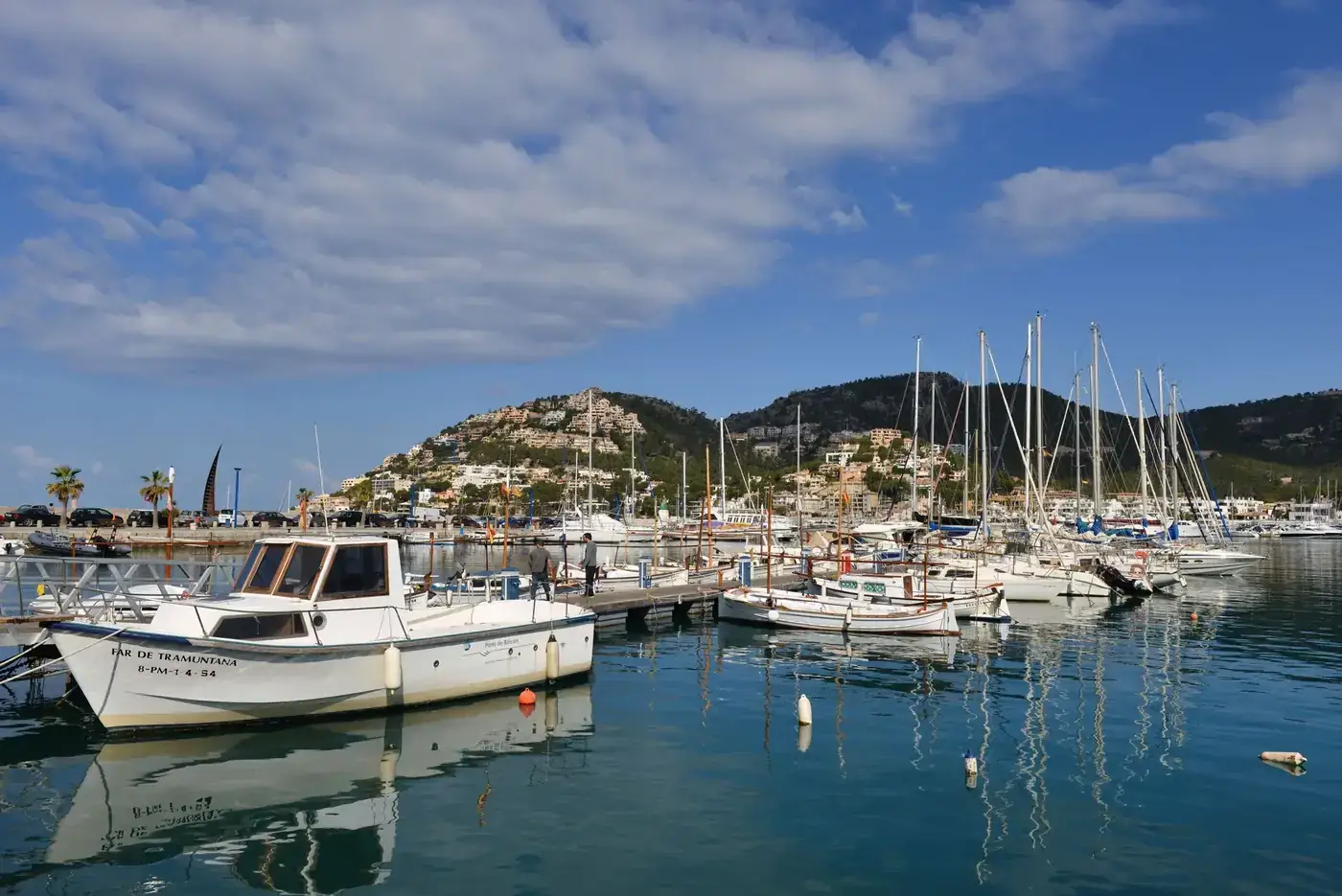 Idyllic marina with boats in Mallorca, Spain during a sunny day.