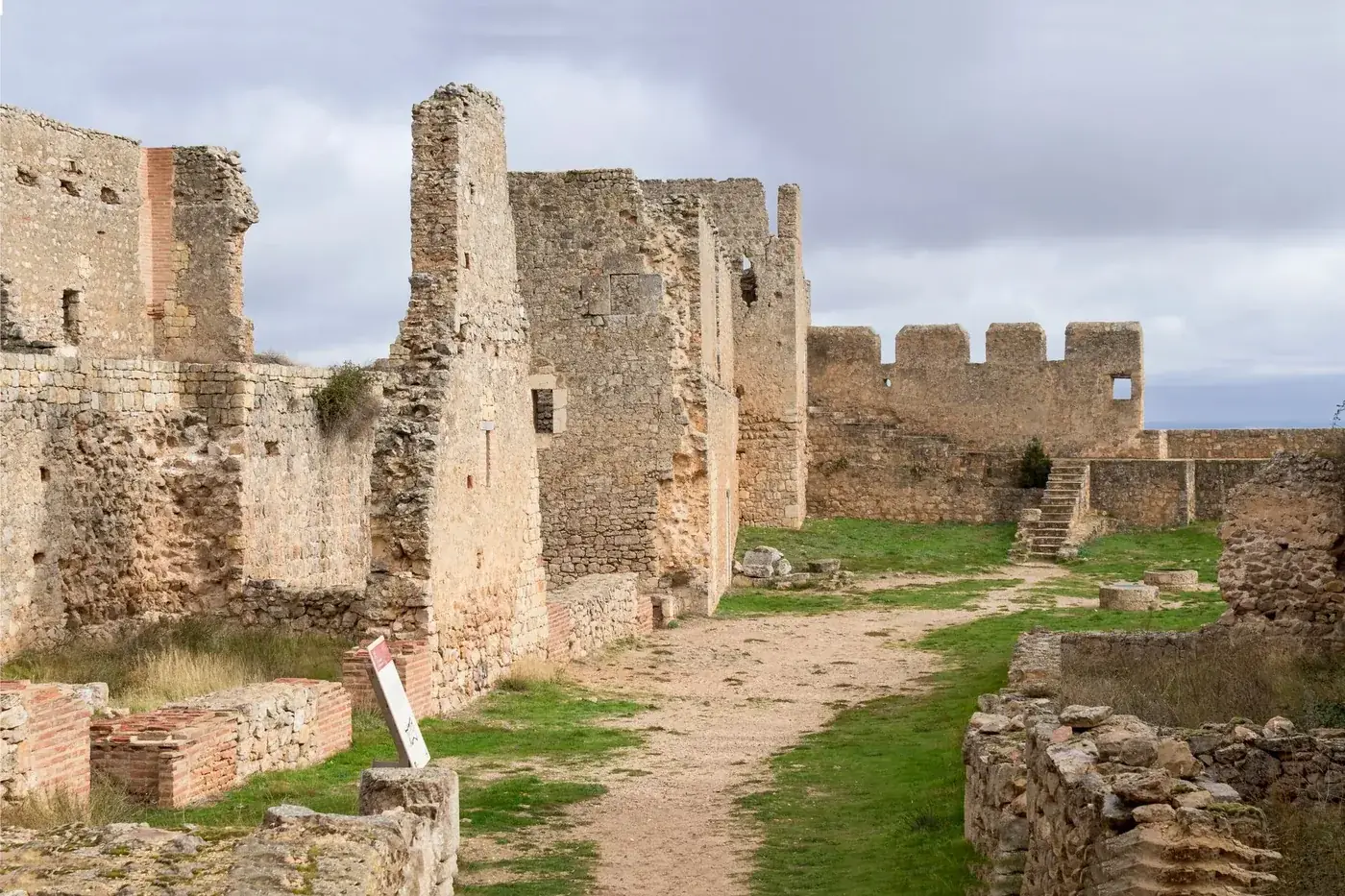 Explore the ancient stone ruins of Ciudad de Osma Castle in Spain, a popular tourist destination.