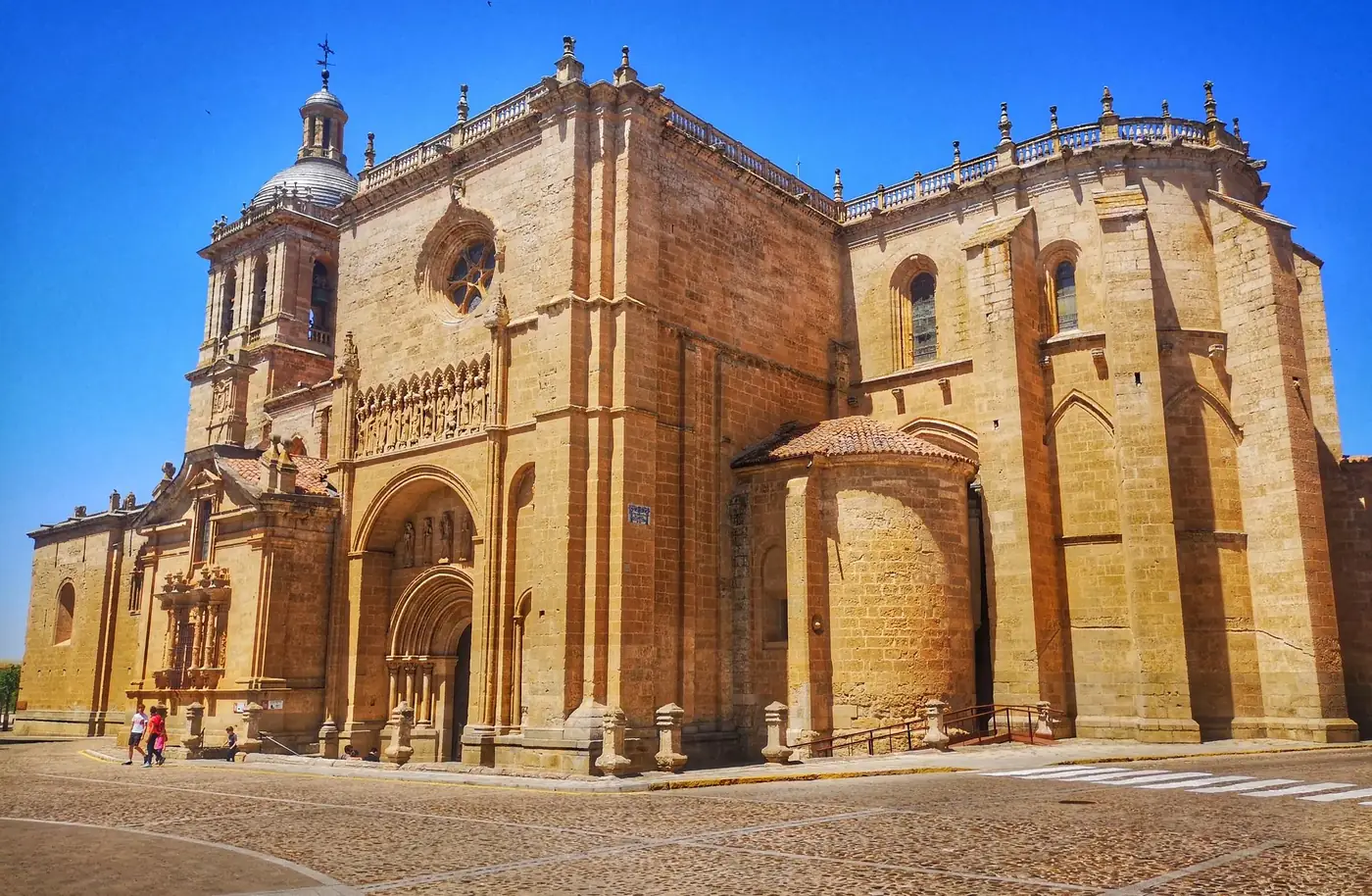 Stunning architectural beauty of historic cathedral with clear blue sky background.