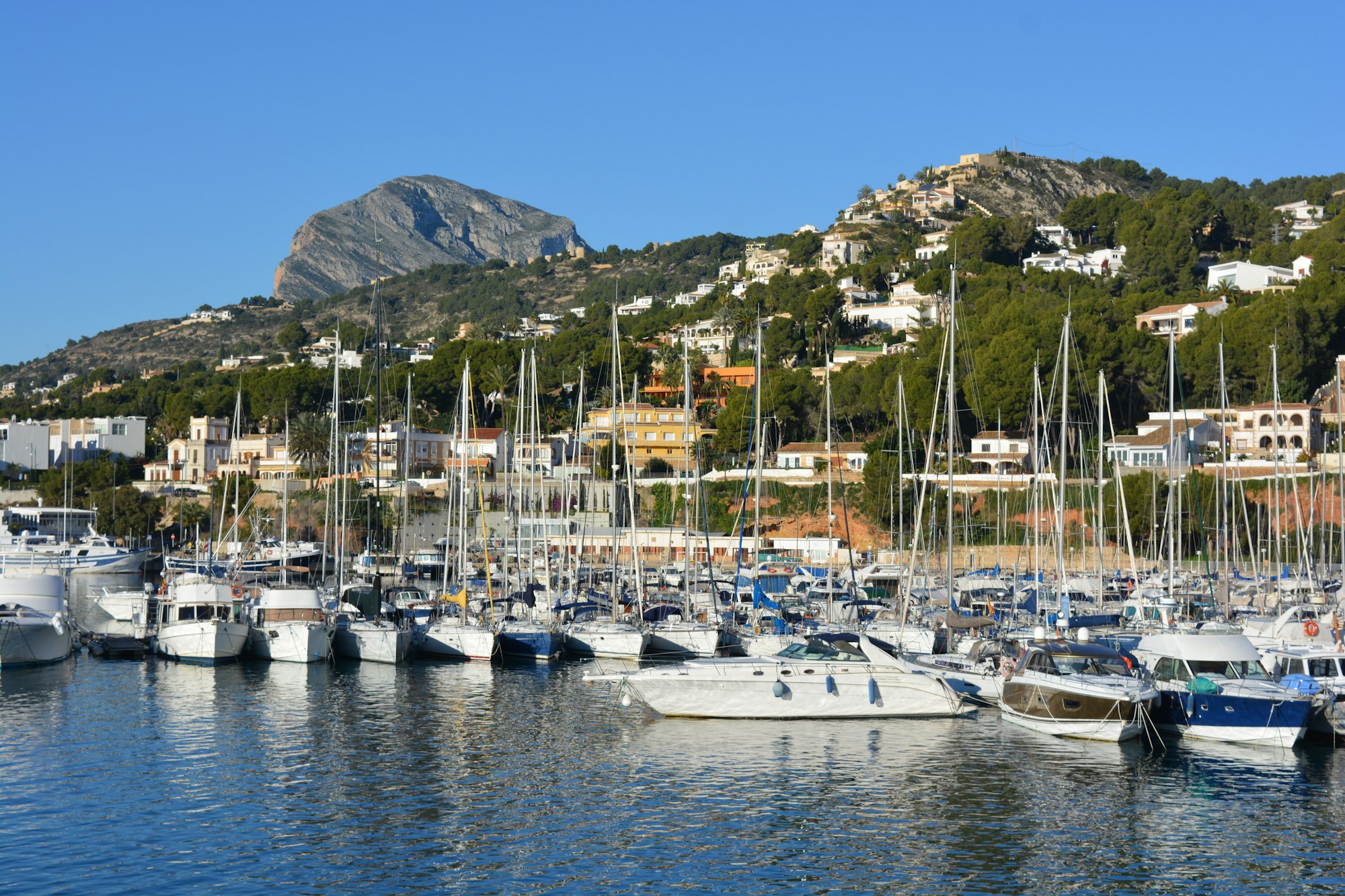 Boats in harbour in the Mediterranean coastal resort of Javea, Alicante Province, Spain